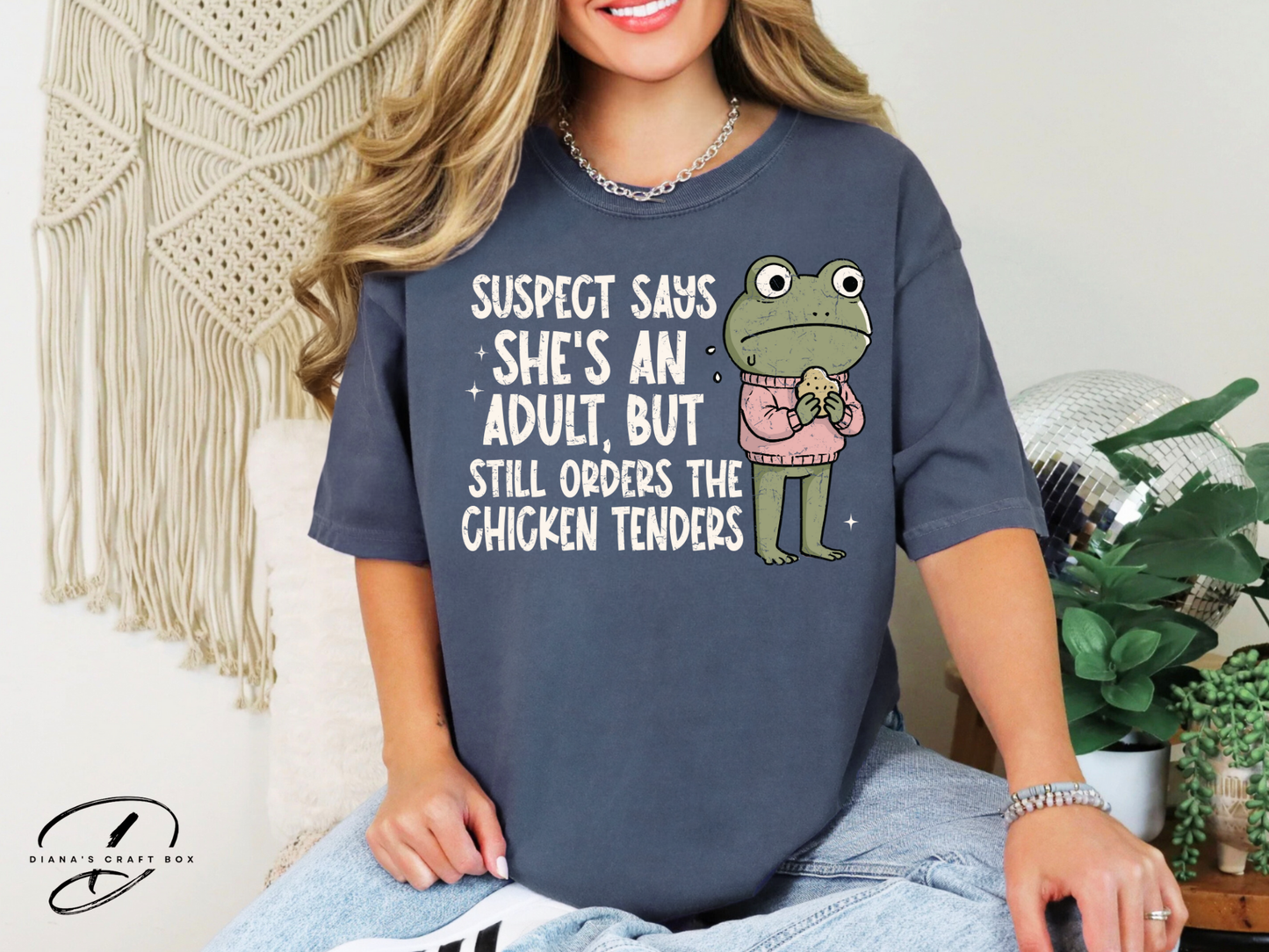 Suspect is an adult but still order chicken nuggets T-shirt